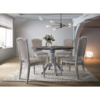 Table de salle à manger de style vintage à finition vieillie avec pied rond et 4 chaises rembourrées